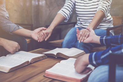 christian group praying together